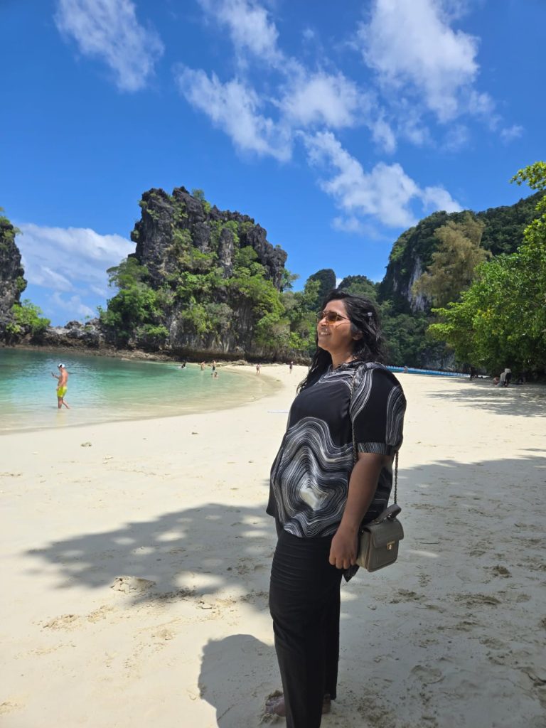 Dr. Nuzhat Jahan on a tropical beach in Thailand